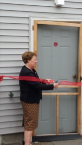 Mrs. Higgins cuts the ribbon, officially opening the new facility - The David Higgins Cocina and Activity Center!